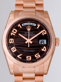 Black with Rose Gold Phnom And Arabic numerals Rolex 118205 Mens 18kt Rose Gold Watch