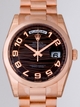 Black with Rose Gold Phnom And Arabic numerals Rolex 118205 Mens 18kt Rose Gold Watch